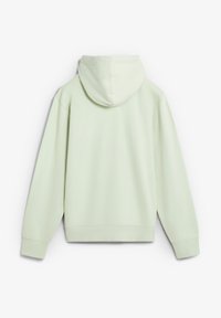 Sudadera verde menta con capucha ajustable, ribete en el dobladillo y los puños. Tela suave, corte relajado y con un diseño de costuras mínimas en la parte posterior.