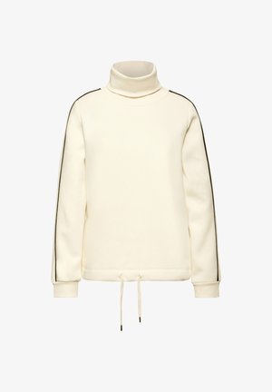 Sudadera de cuello alto color crema con rayas negras a los lados de las mangas y cordones colgando en el dobladillo.