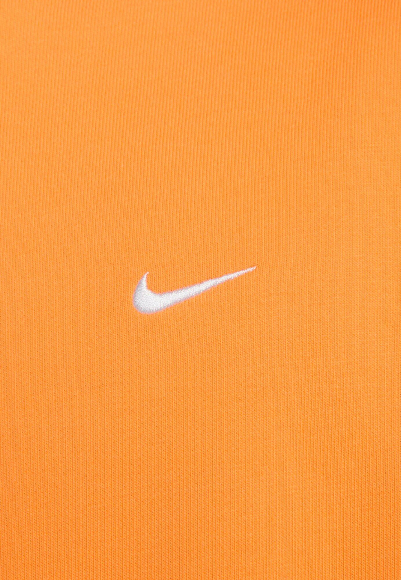 orange nike check