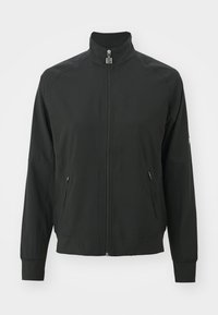 Must must jacket, mille kaelus, esimeses tõmblukus, kaks tõmbluku küljetaskut ja pikad varrukad, millel on kitsad mansetid.
