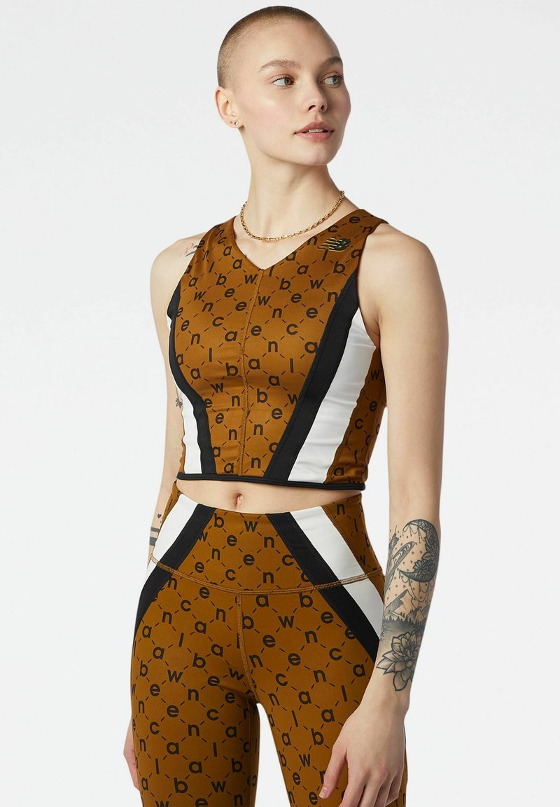 New Balance Top mosterdgeel New Balance Top mosterdgeel