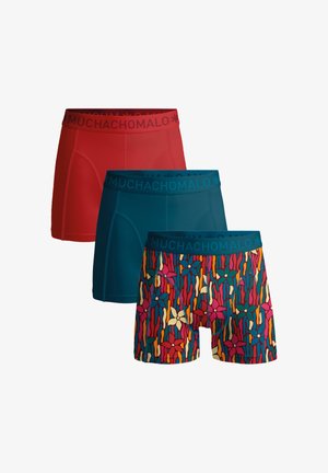 Three pairs of men's boxers: one red, one teal, and one patterned with colorful abstract shapes. Each has a branded elastic waistband.