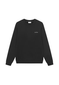 Melna kokvilnas sporta krekls ar apaļu izgriezumu un garām piedurknēm. Uz kreisās krūtis ir balta uzraksts "Les Deux". Gluda tekstūra.