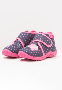 Blue polka-dotted shoes with pink accents and a butterfly design, featuring a hook-and-loop strap for easy wear and a textured sole.