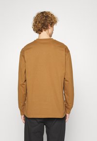 Carhartt WIP AMERICAN SCRIPT - Topper langermet - hamilton brown