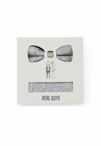 Grey paisley pattern bow tie and pocket square set in a white box, featuring a cut-out design and "REAL GUYS" text on the bottom.
