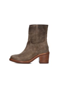 Brown suede ankle boot with a stacked wooden block heel and rounded toe, shown in side profile on a white background.