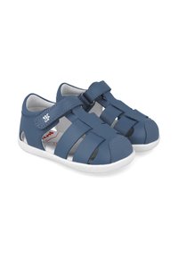 Sandali sintetici blu con punta chiusa e numerosi cinturini orizzontali, dotati di suola in gomma bianca e cinturino regolabile in Velcro.