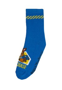 Calzino di cotone blu con una grafica di un cane dei cartoni animati, accentuazione grafica gialla nella parte superiore e la parola "CHASE" in giallo nella parte inferiore.