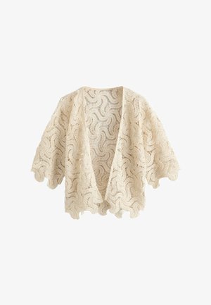 Flødefarvet cardigan med åbent front, lavet i blonder med buede kanter og bølget blomstermønster i hækling, med albuelange ærmer.