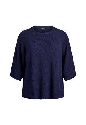 Jūras spēku zila adīta džemperis ar īsām piedurknēm un apaļu kakla izgriezumu. Iezīmē teksturētu audumu un brīvu, kvadrātveida piegriezumu. Nav redzamu aizdares elementu.