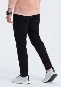 Ombre JOGGER - Jeans slim fit - black