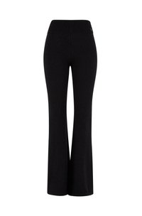 Black flared pants with a ribbed waistband, made from a soft fabric, featuring a smooth texture and minimal detailing.