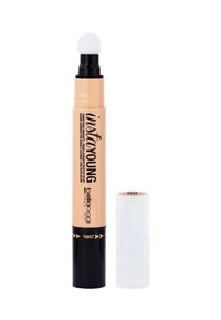 Correttore in penna beige con un applicatore rotondo e morbido. Base nera elegante con accenti dorati e nome del prodotto in carattere grassetto.
