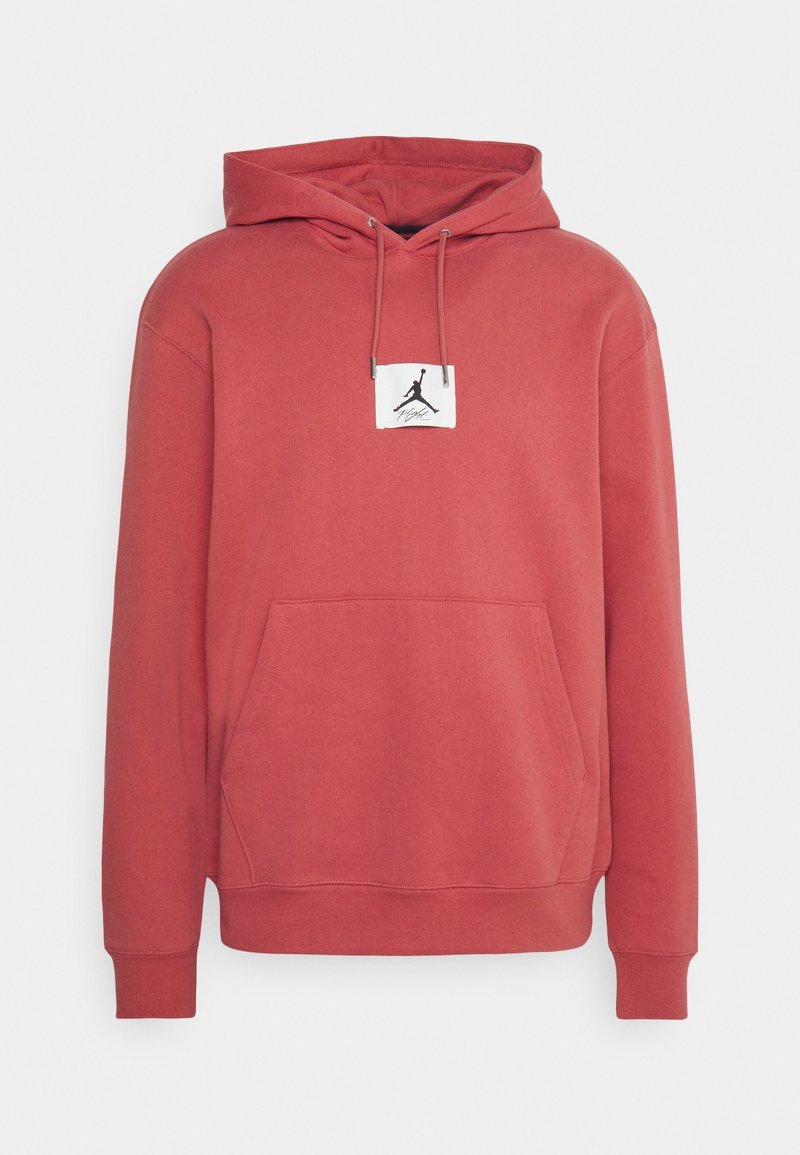 Sweat à capuche rouge à enfiler avec poche avant, cordons et petite étiquette blanche avec logo Jumpman noir et signature sur la poitrine.