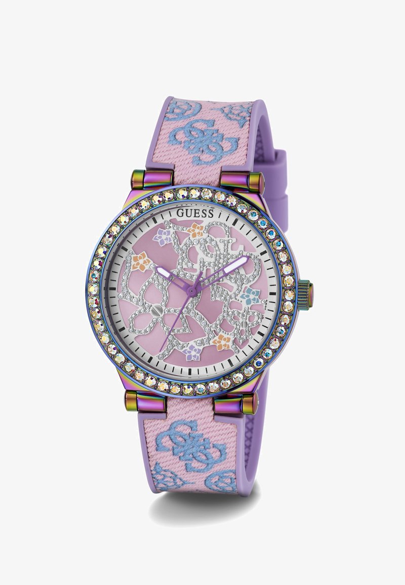 Lila Silikon-Uhr mit einem Stoffarmband im Blumenmuster. Das runde Zifferblatt hat silberne Akzente und eine Kristall-Lünette, mit bunten grafischen Details.