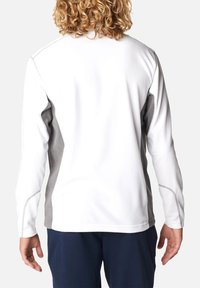 Langarmhemd in Weiß mit grauen Seitenteilen, mit glatter Textur, kontrastierenden Nähten und entspannter Passform.