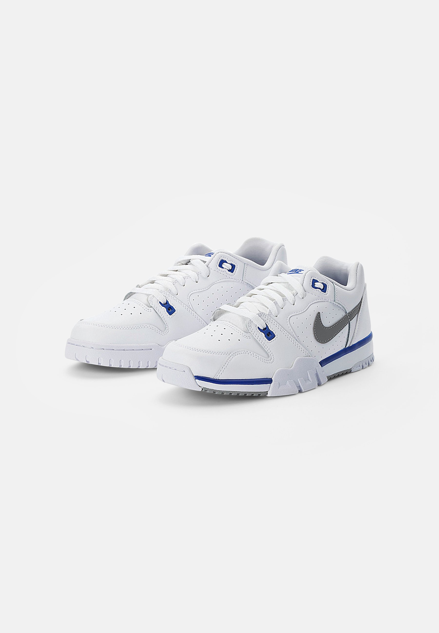 all white cross trainers