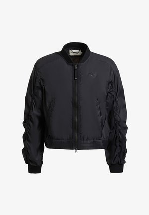 Schwarze Bomberjacke mit Frontreißverschluss, gerafften Ärmeln, elastischen Bündchen und Saum, kleinem Logo auf der Brust und Stehkragen.