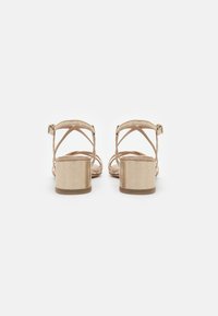 Tamaris Riemensandalette - light gold