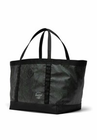 Grand sac fourre-tout noir et vert foncé avec deux longues poignées, une base rectangulaire et le logo de la marque Herschel sur le devant.