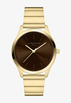 Guldtonet metalur med en brun urskive, der har slanke timeindikatorer og visere. Remmen har en børstet overflade med et linksdesign.