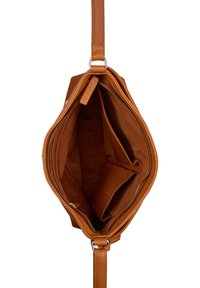 Sac à main en cuir tan avec fermeture éclair, doté d'un intérieur spacieux, de deux compartiments et d'accents texturés sur un côté.