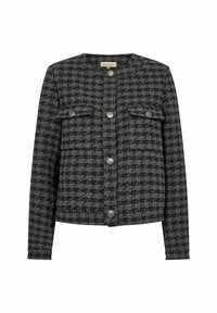 Harmaa houndstooth-takki, joka on valmistettu teksturoidusta kankaasta. Takissa on pyöreä kaulus, kaksi rintataskua ja hopeiset napit edessä.