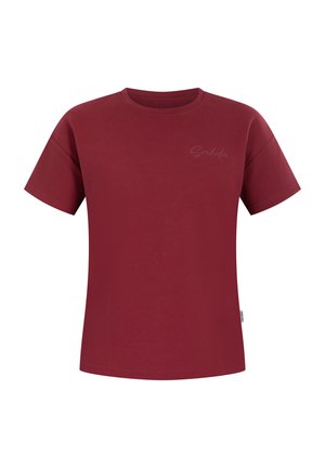 Burgundin värinen crew neck T-paita, joka on valmistettu puuvillasta. Lyhyet hihat, joissa on hienovarainen "Smilder"-painatus vasemmalla rintakehällä. Liukas pinta.