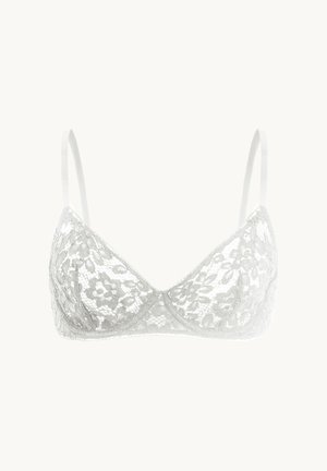 Vit spetsbralette med blommönster, mjuka triangulära kupor och justerbara axelband. Genomskinlig textur över hela. Klassisk design.