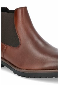 Brązowy skórzany trzewik sięgający kostki z elastycznymi panelami bocznymi, gładką fakturą, okrągłym noskiem oraz czarną gumową podeszwą z bieżnikiem zapewniającym przyczepność.