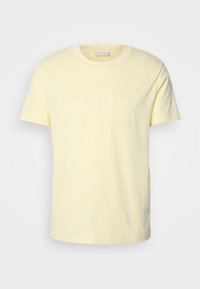 TONAL SHIELD - Potiskana majica - yellow shine