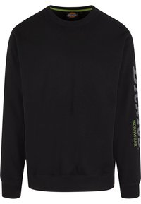 Fekete, hosszú ujjú, pamut pulóver. Kerek nyakkivágással, bordázott mandzsettákkal rendelkezik, és a "Dickies WORKWEAR" felirat fehér és zöld színben található az ujján.