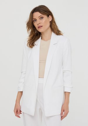 Blazer bianco con maniche lunghe, davanti aperto e due tasche laterali. Tessuto liscio, design sartoriale e stile minimalista.