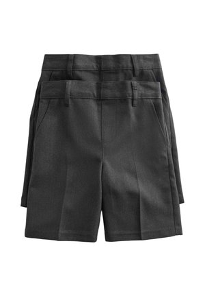 Dos pares de pantalones cortos negros a medida con presillas para cinturón y bolsillos delanteros, apilados uno ligeramente detrás del otro sobre un fondo blanco.