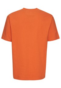 Orange bomullströja med korta ärmar, rund halsringning och enkel baksidedesign. Har en slät yta och lätt tyg.