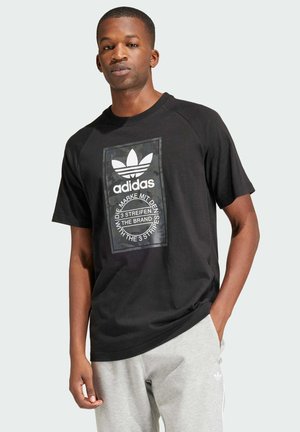 adidas Originals CAMOUFLAGE TONGUE - Print T-shirt - black