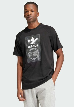 adidas Originals CAMOUFLAGE TONGUE - T-Shirt print - black