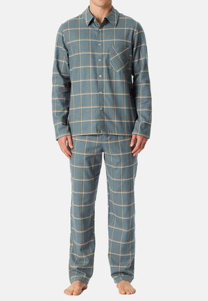 Ensemble de pyjama à carreaux en bleu et beige. Chemise à manches longues avec boutonnage et poche sur la poitrine. Pantalon assorti avec taille élastique. Texture de tissu douce.