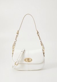 White leather handbag with a curved shape, adjustable beige strap, and gold hardware accents. Features a clasp closure on the front.