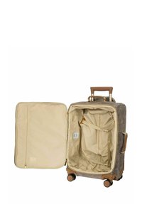 Valise à roulettes avec un extérieur texturé gris, poignée et accents beige, présentant un intérieur spacieux beige avec une poche zippée et des sangles.
