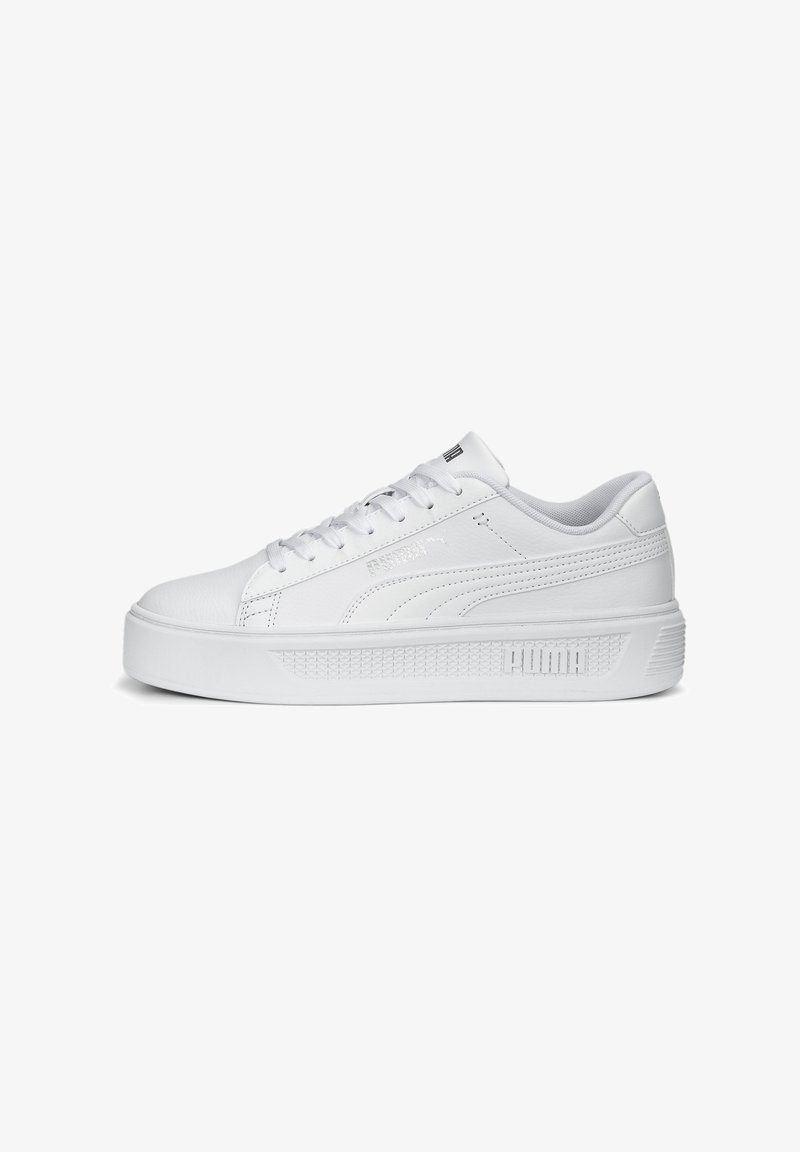 White sneaker with a smooth leather exterior, round toe, flat laces, a thick platform sole, and subtle branding on the side and tongue.