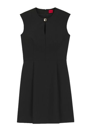 Zwarte mouwloze jurk met ronde halslijn, klein vooraan sleutelgat met sluiting, getailleerde taille en een A-lijn rok.
