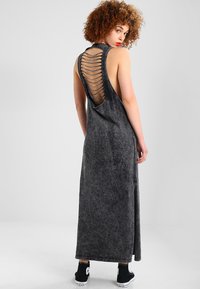 Urban Classics LADIES RANDOM WASH BACK CUT DRESS - Jerseyklänning - black