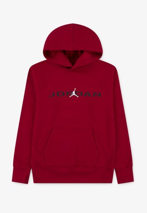 Roter Hoodie aus weichem Stoff mit einer vorderen Kängurutasche. Verfügt über einen schwarzen "JORDAN"-Aufdruck und ein wei ßes Jumpman-Logo auf der Brust.