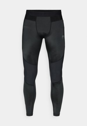Black athletic leggings with a fitted design, featuring a smooth texture, mesh accents, and contrasting matte and shiny panels.