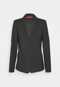 Černý přizpůsobený blejzr se strukturovaným designem, dvěma knoflíky, klopovými límci a bočními kapsami. Vyrobeno z hladké látky s elegantním povrchem.