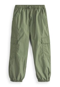Pantalon cargo vert clair avec taille élastique, cordon de serrage, poches latérales à rabat, poches avant et poignets élastiques aux chevilles.