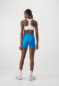 Nike Performance W NKCT DF ADVTG BALSHRT REG - Tights - light photo blue/white