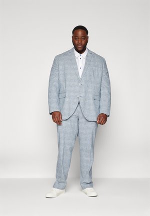 Light blue checkered suit with two buttons, matching trousers, and a white collared shirt. Notable design includes prominent lines and textures.